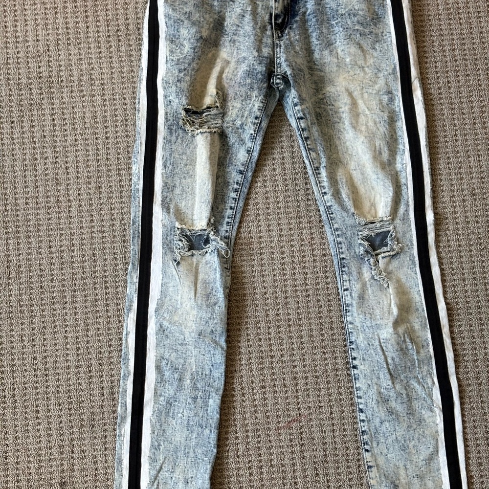 Stylish Distressed Blue Jeans with Black Stripes